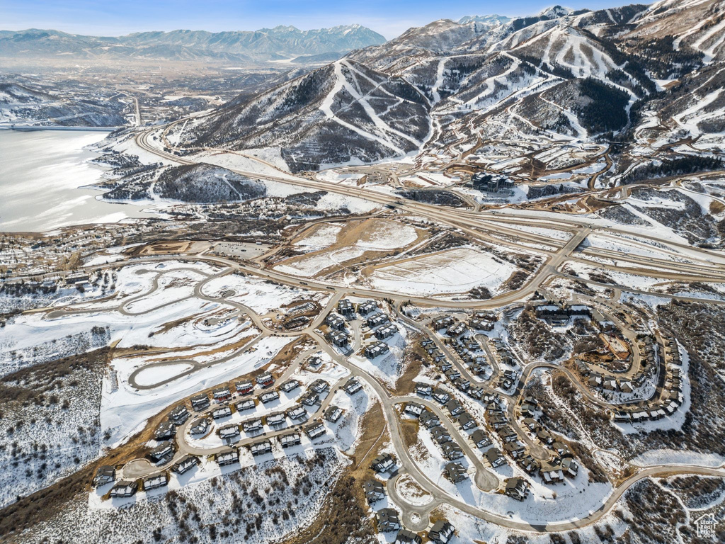 Snowy aerial view with a mountain view
