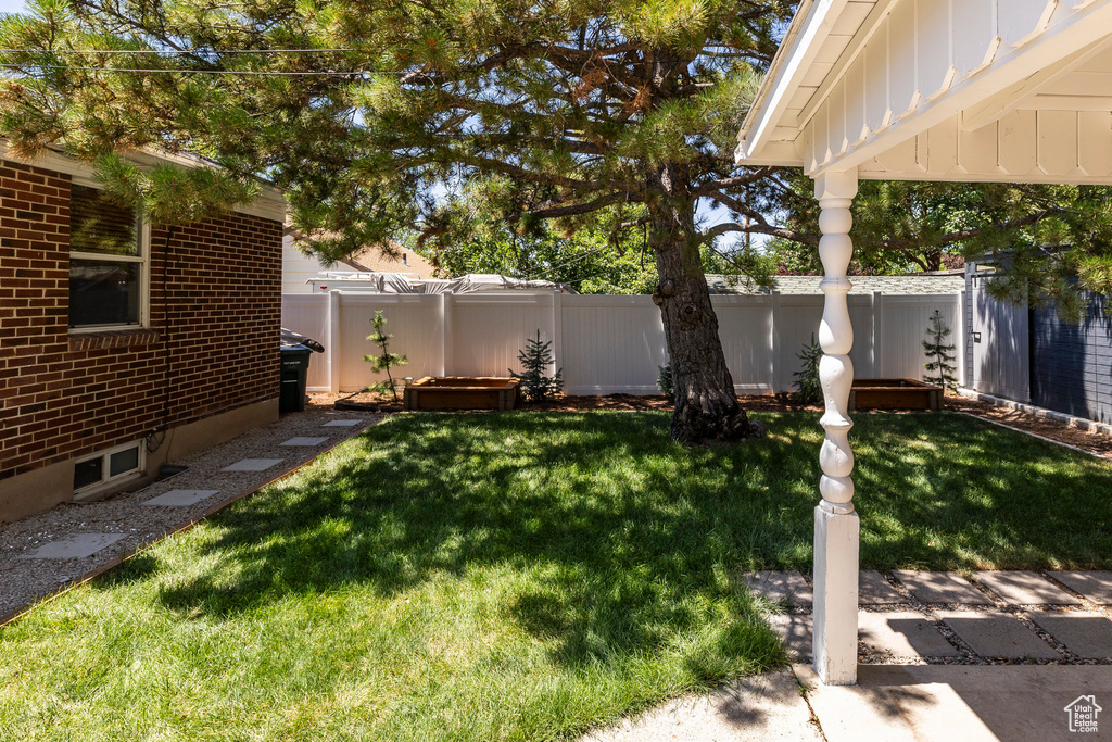 View of fenced backyard