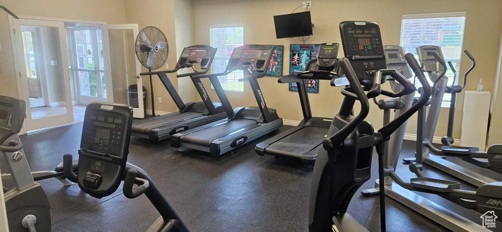 Workout area featuring baseboards