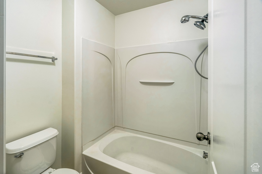 Bathroom featuring shower / washtub combination