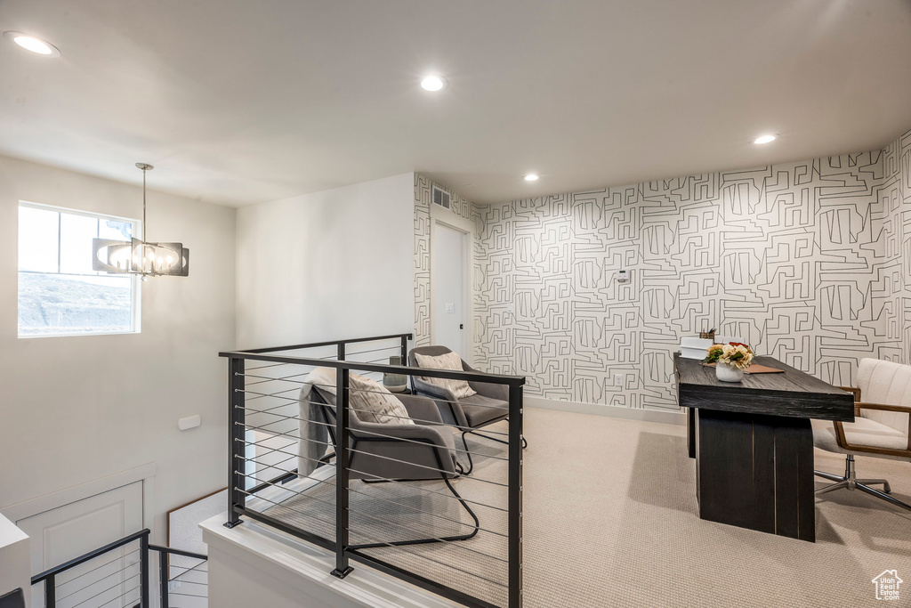 Corridor featuring wallpapered walls, an upstairs landing, carpet flooring, a chandelier, and recessed lighting