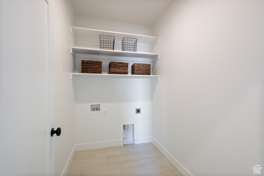 Laundry room with hookup for an electric dryer and washer hookup