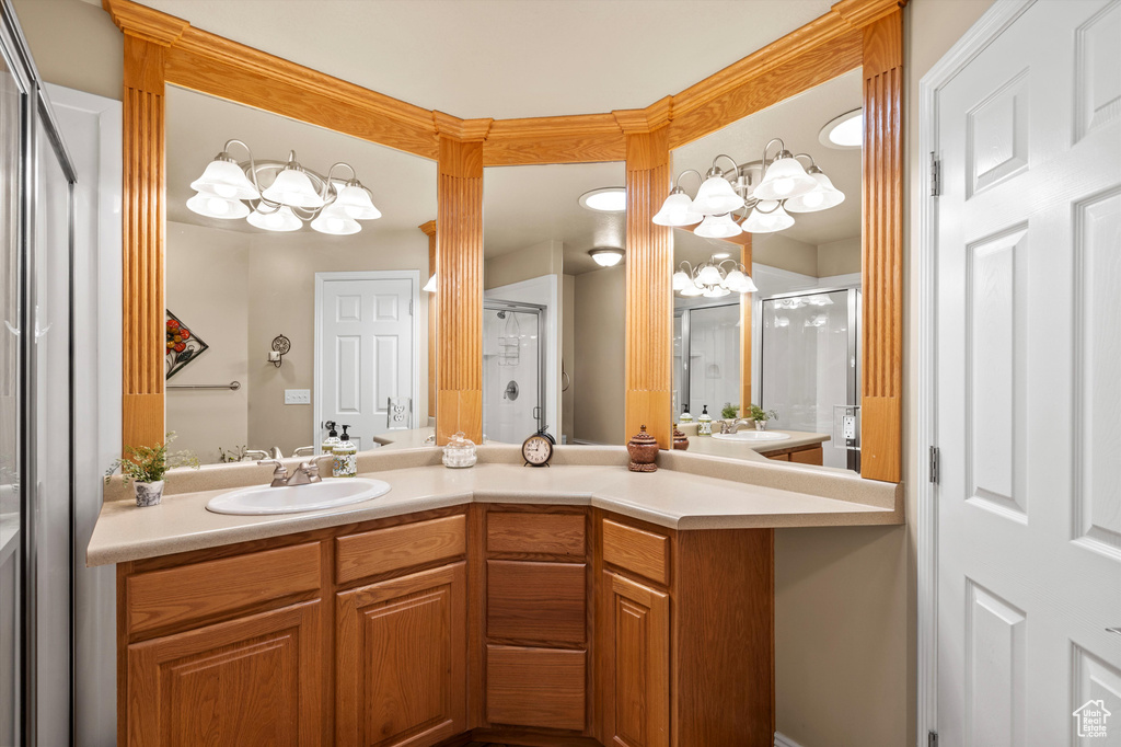 Full bathroom with a shower stall and vanity