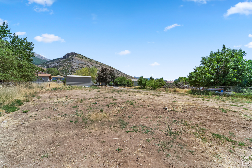 View of yard with a mountain view