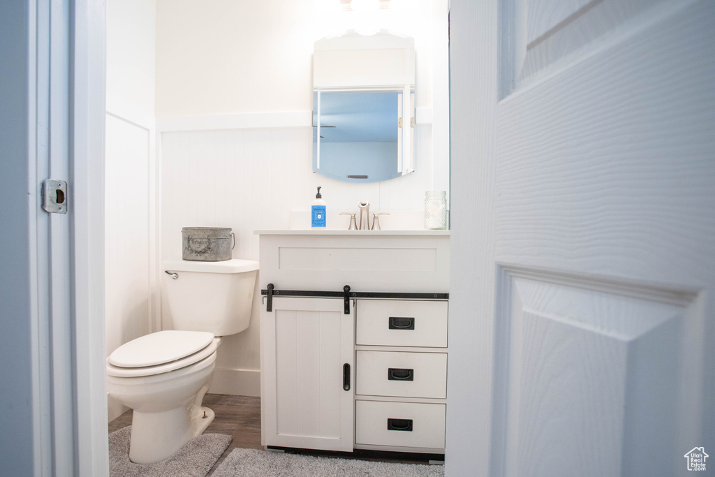 Bathroom with toilet and vanity