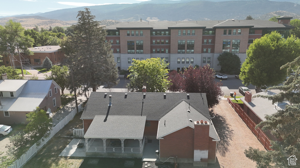 View of subject property featuring a mountain backdrop