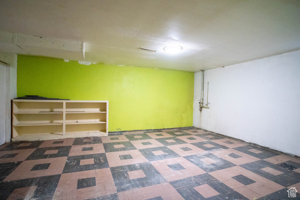 Finished below grade area with tile patterned floors