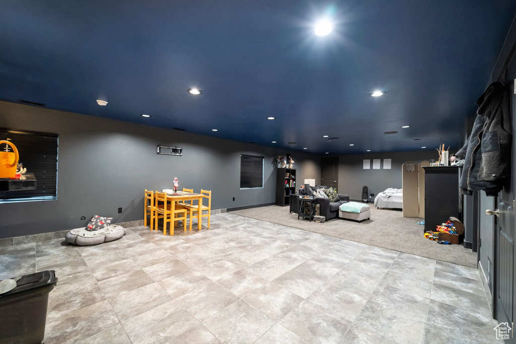 Living area featuring recessed lighting and carpet floors