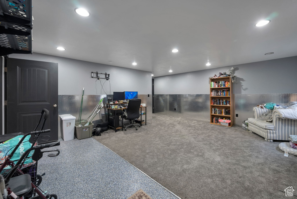 Carpeted office space featuring recessed lighting