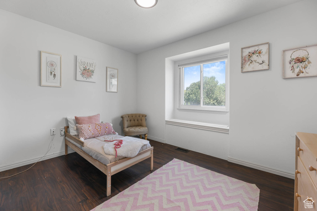 Bedroom featuring wood finished floors