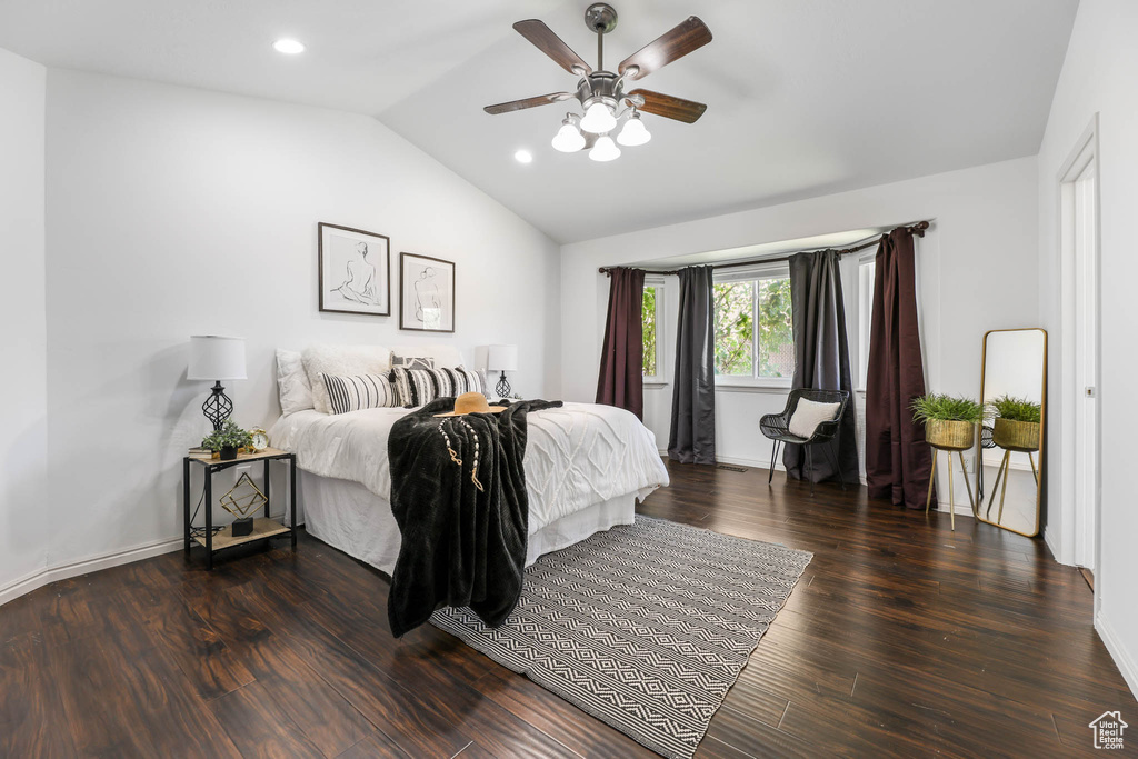 Bedroom featuring lofted ceiling, wood finished floors, recessed lighting, and a ceiling fan