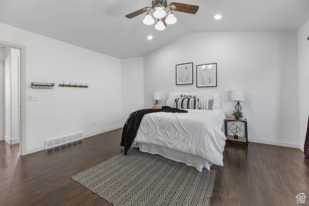 Bedroom featuring wood finished floors, lofted ceiling, recessed lighting, and ceiling fan