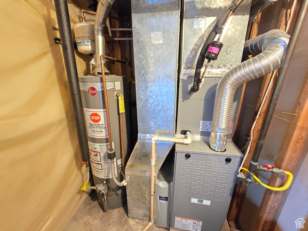 Utilities featuring water heater and heating unit