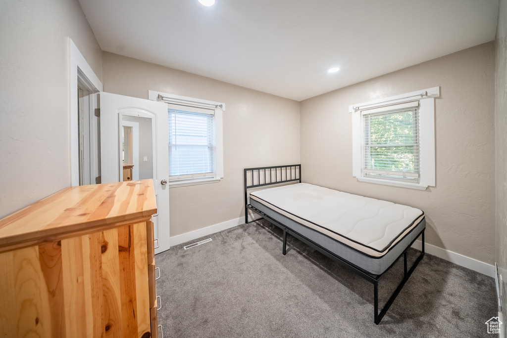 Bedroom with carpet
