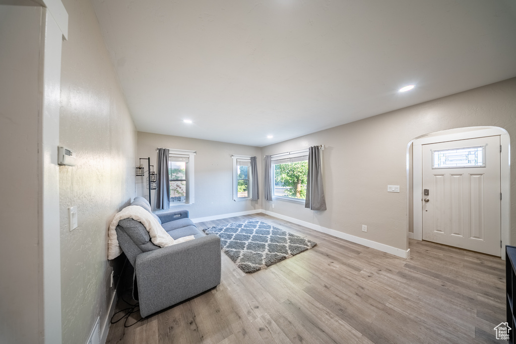 Entrance foyer featuring wood finished floors and recessed lighting