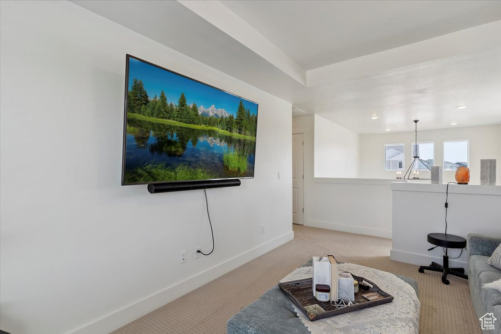 Living area with carpet floors
