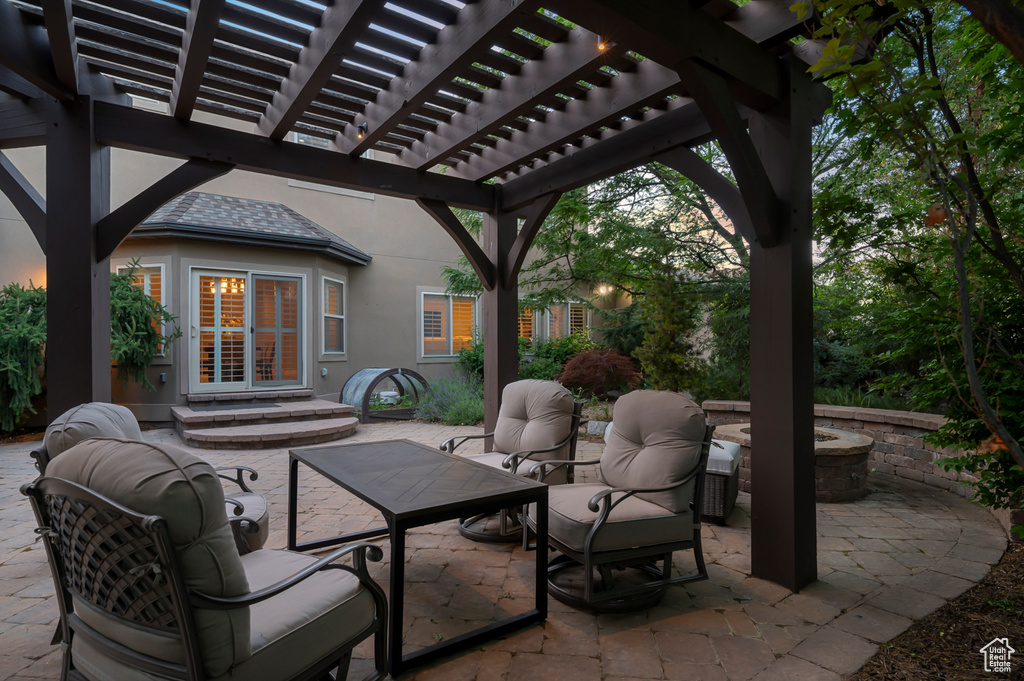 View of patio / terrace featuring outdoor lounge area and a pergola