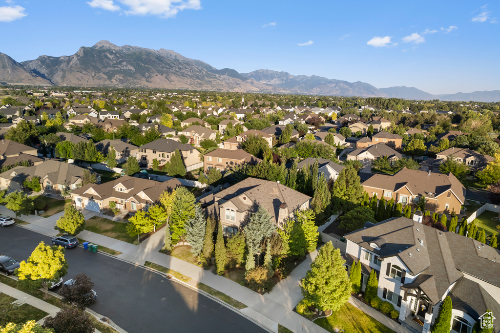 Aerial view of residential area with a mountain backdrop