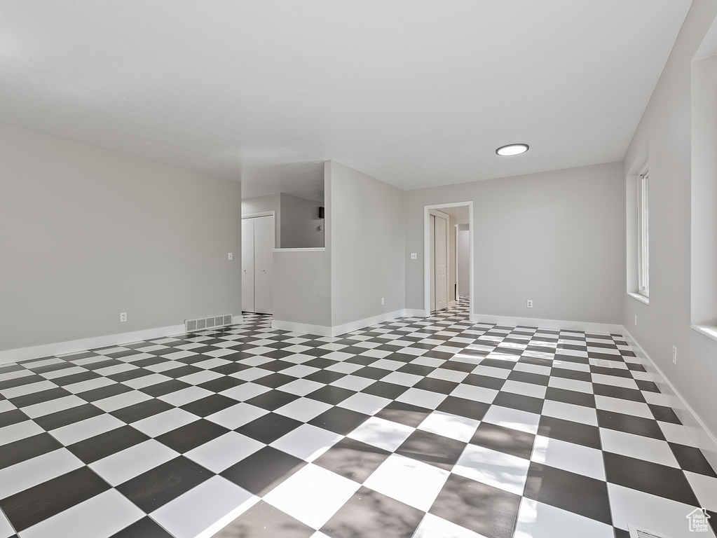 Empty room with baseboards