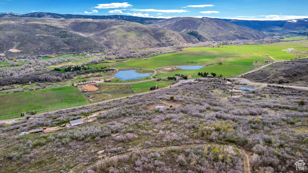Mountain view with a large body of water and a local golf course