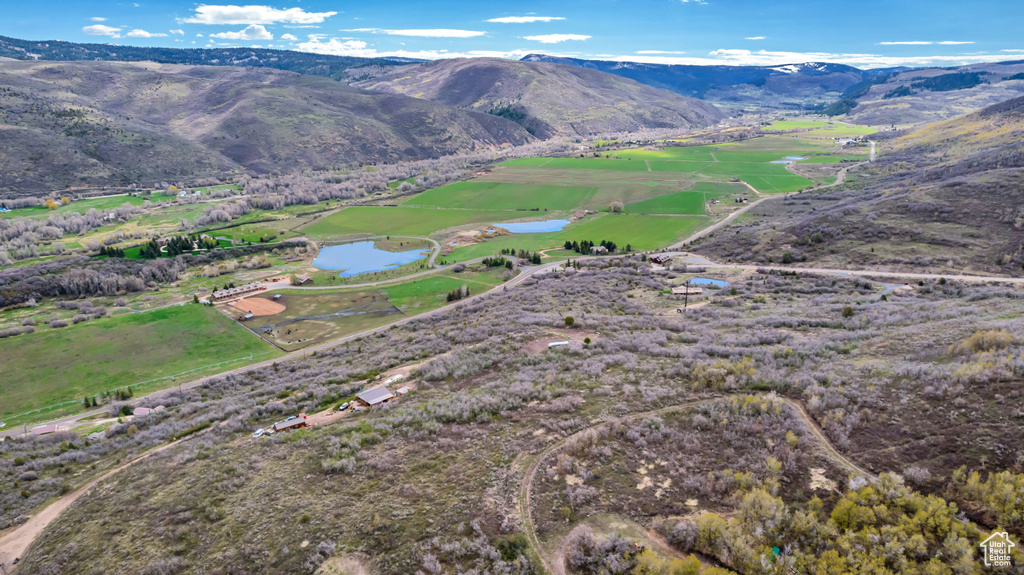 Mountain view featuring a large body of water