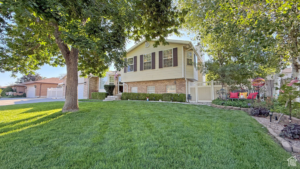 View of front of house with brick siding
