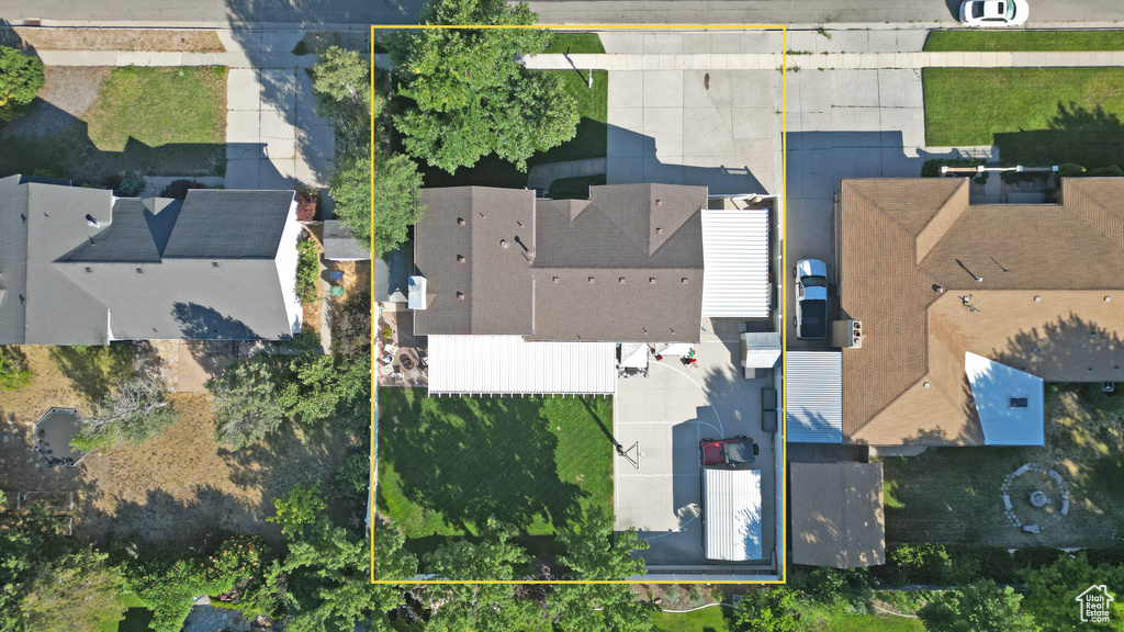 Aerial view of property and surrounding area with property parcel outlined