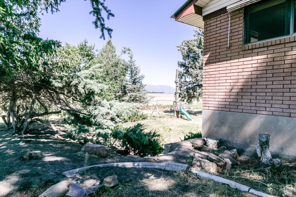 View of yard with a mountain view