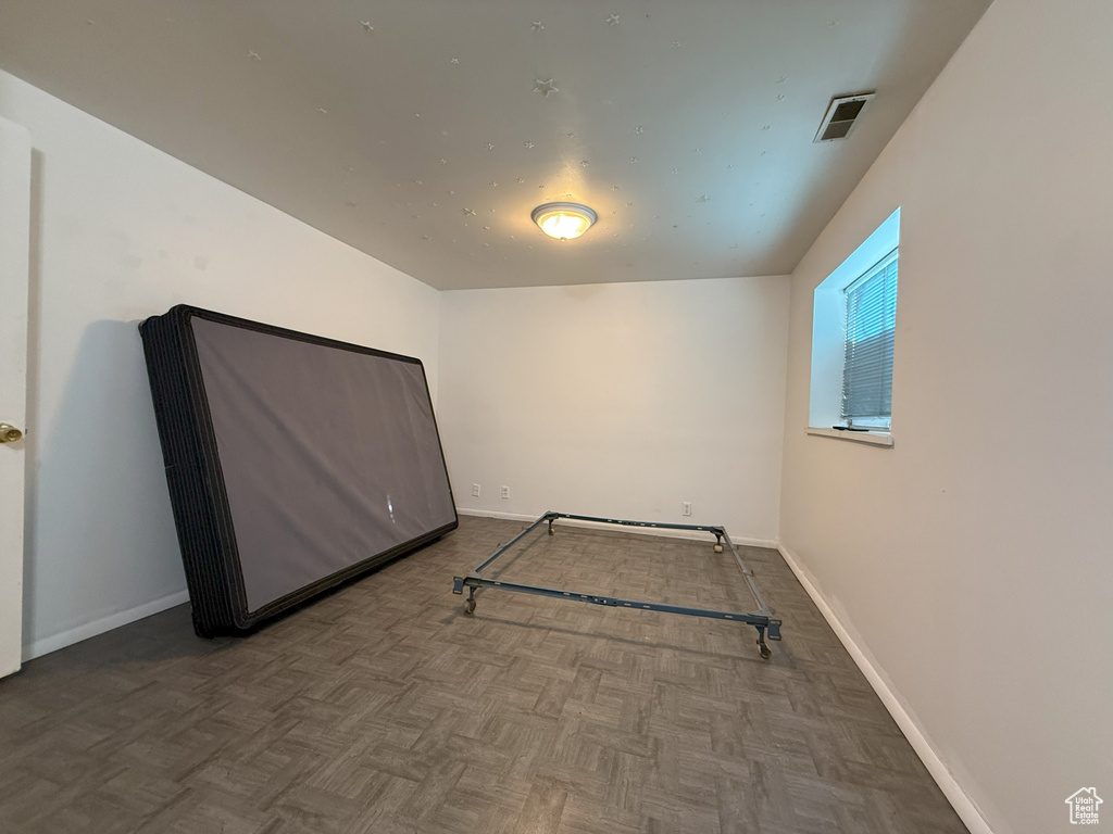 Unfurnished bedroom featuring baseboards
