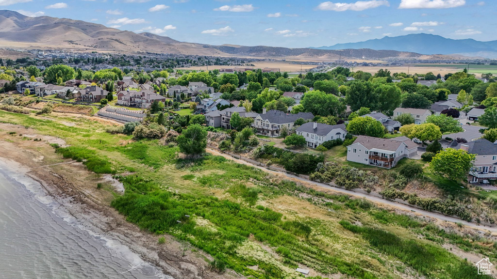 Aerial view of residential area featuring mountains