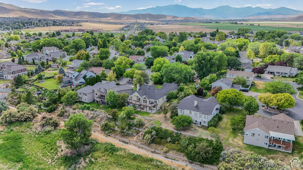 Aerial view of residential area with a mountainous background