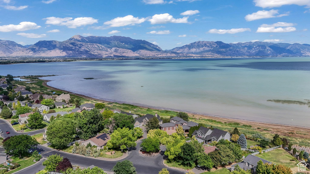 Aerial view of residential area with a water and mountain view