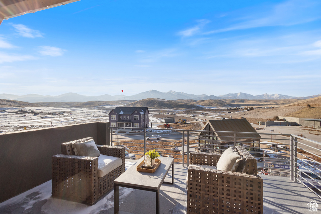 Patio / terrace featuring a mountain view