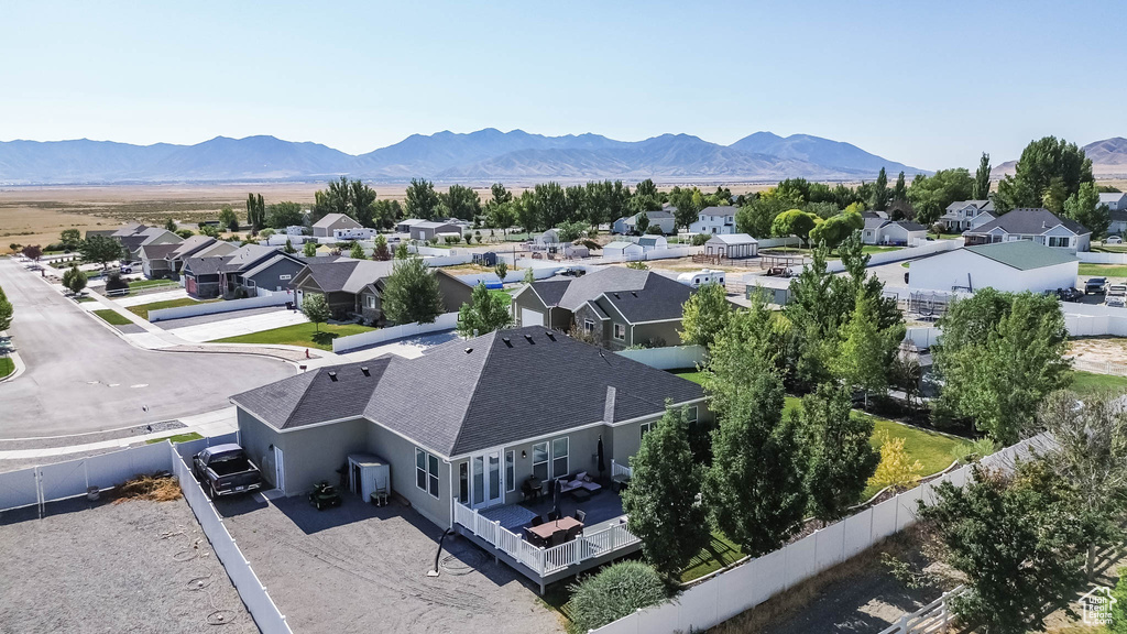 Aerial perspective of suburban area with mountains