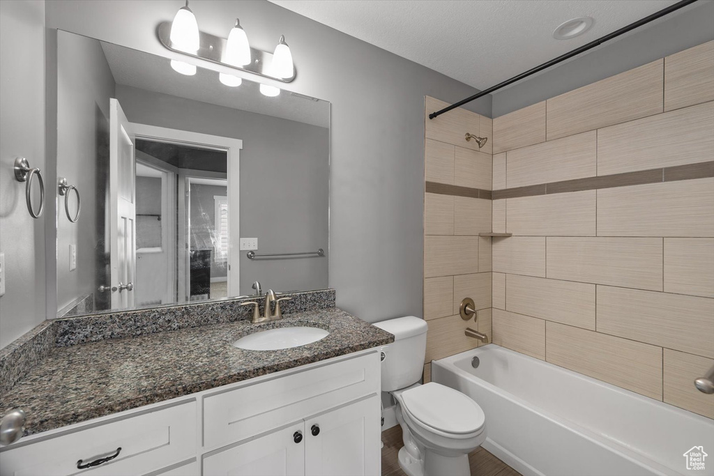 Full bathroom with vanity and shower / bathtub combination