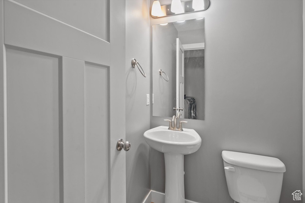 Bathroom with toilet and a sink