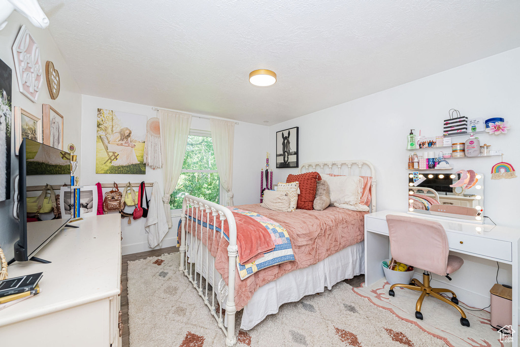 Bedroom featuring light wood-style floors