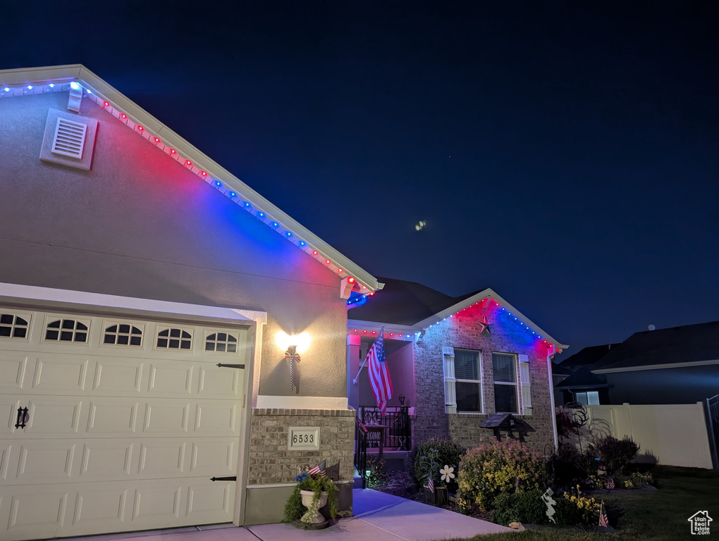 View of front of house featuring stone siding
