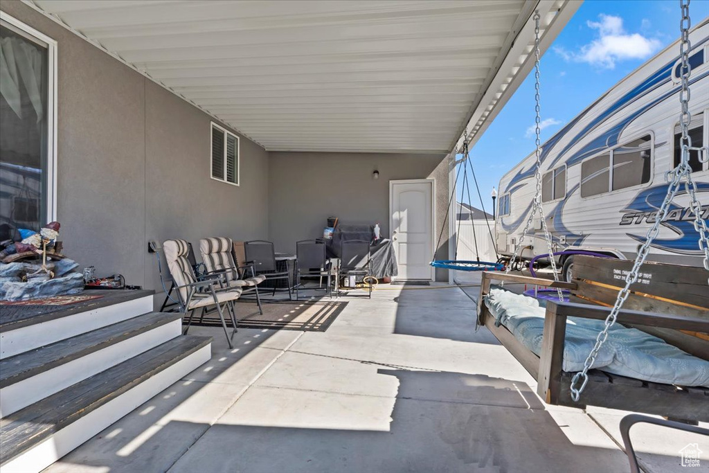 View of patio with a trampoline