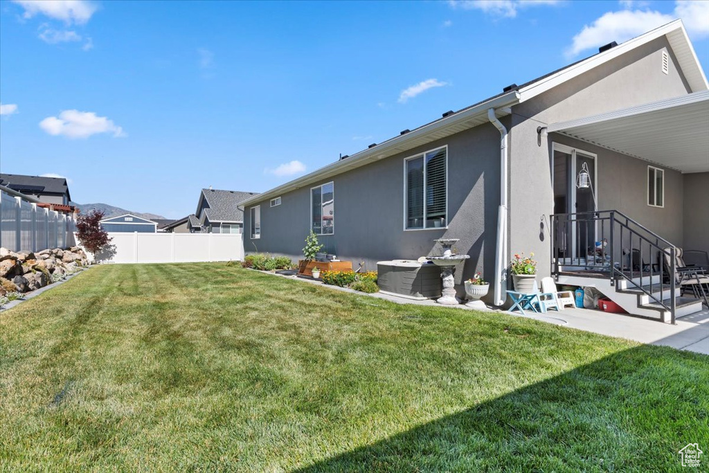 View of yard featuring a patio
