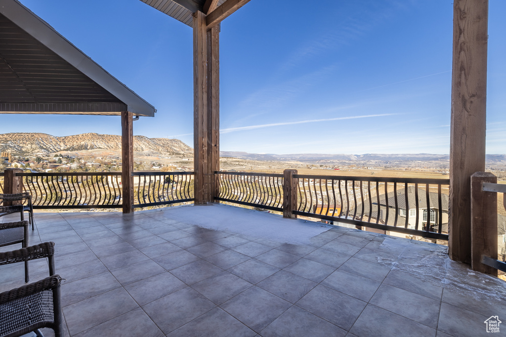 View of patio / terrace with a mountain view