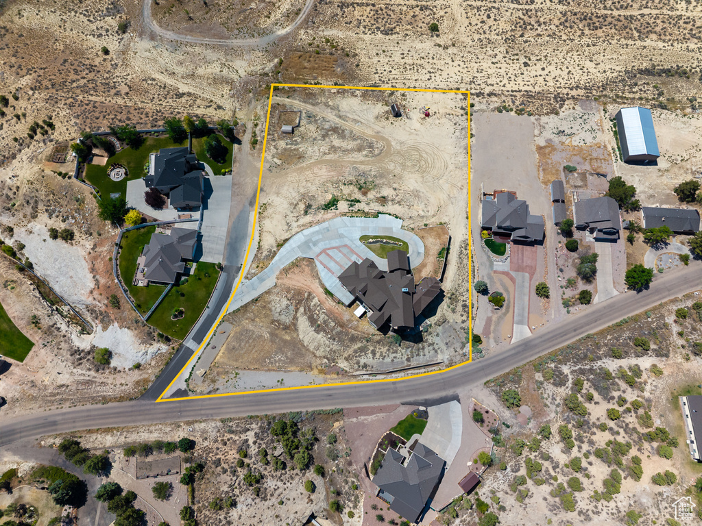 Aerial view of sparsely populated area with property boundaries highlighted