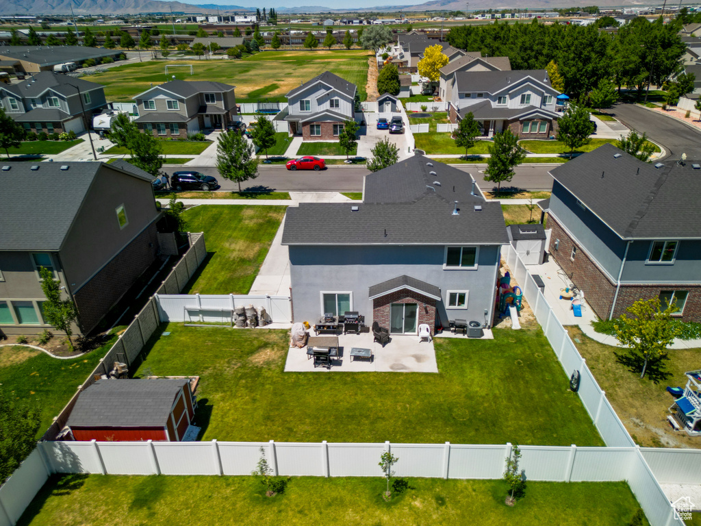 Aerial view of residential area with mountains