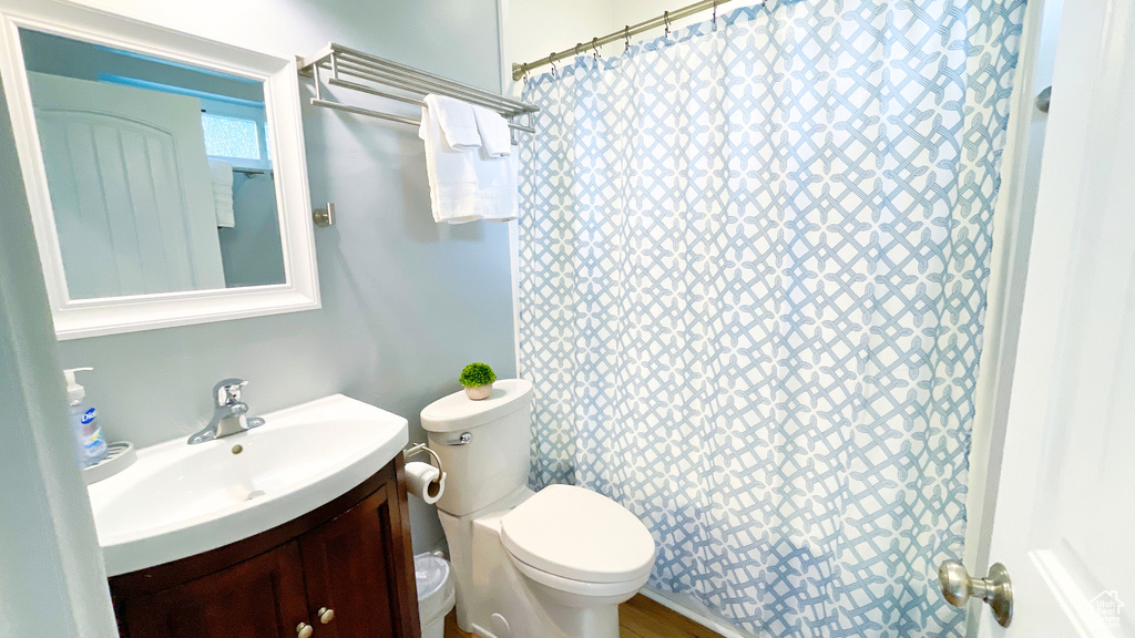 Bathroom featuring vanity and a shower with curtain