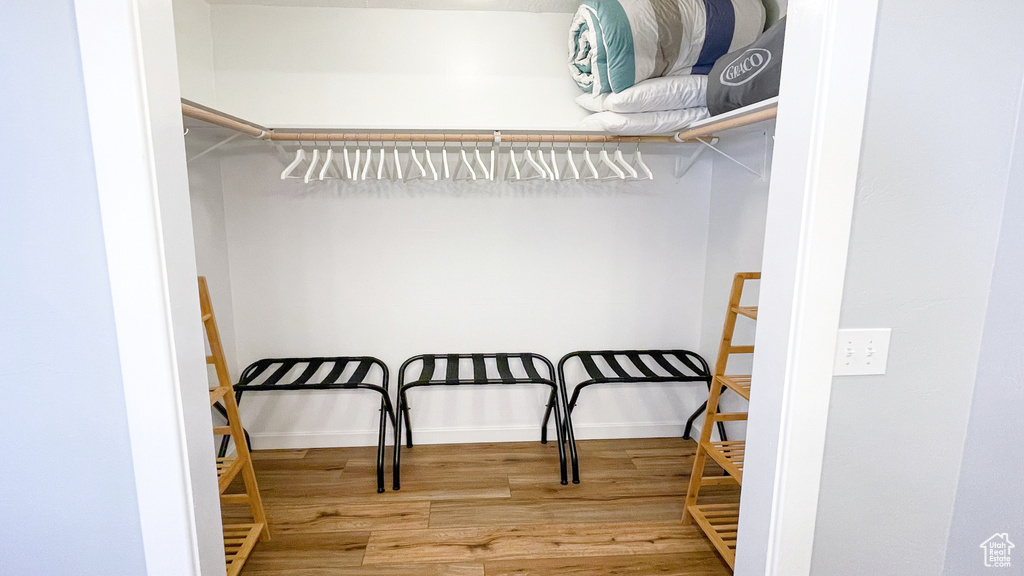 Spacious closet featuring wood finished floors