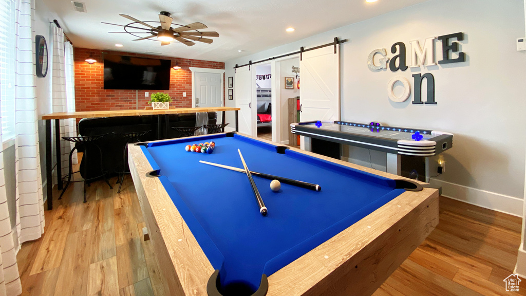 Game room featuring a ceiling fan, wood finished floors, pool table, and recessed lighting