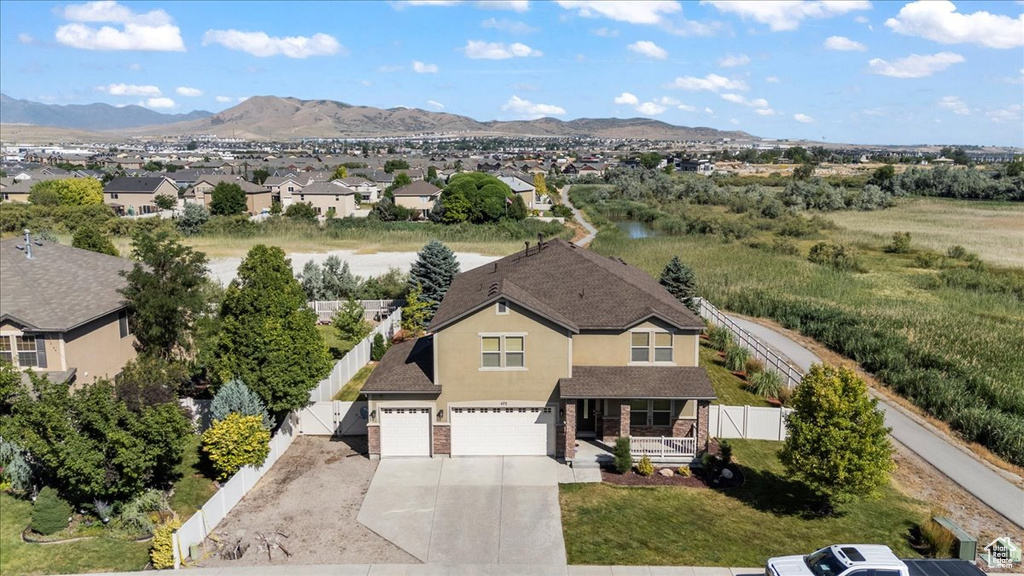 Aerial perspective of suburban area featuring mountains