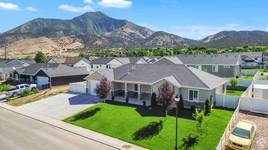 View of mountain background featuring nearby suburban area