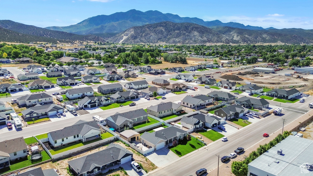 Aerial view of residential area with a mountainous background