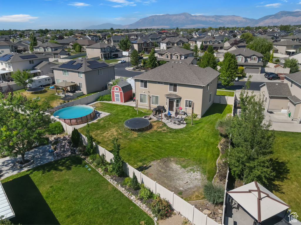 Aerial perspective of suburban area with mountains